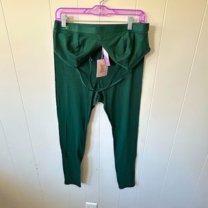 Savage X Fenty green workout leggings and bra